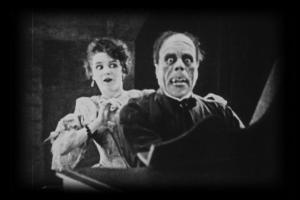 Lon Chaney, Sr., and Mary Philbin in the 1925 Phantom film. Yes, 1925--not the 1929 remake. I know my screenshots when I see them.